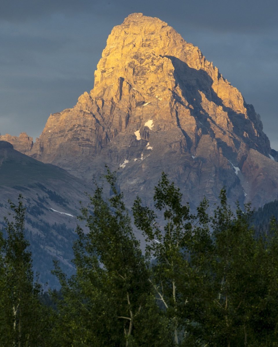 The Grand Teton photographed from our backyard in Driggs, Idaho last evening. A great light show as the sunlight moved up and down this spectacular mountain. This was the last exposure I made just before the setting sun dropped below the horizon casting the scene in complete shadow. #grandteton #bestofthegemstate #tetonvalleyidaho #driggsidaho #orcuttphotography