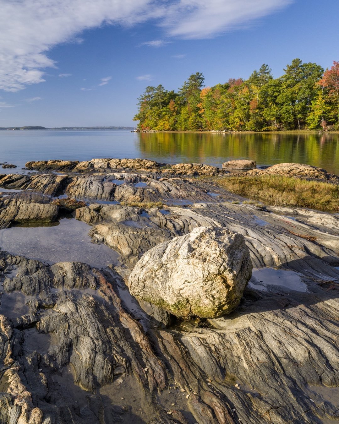 An erratic, probably carried to the coast by the huge glacier that that covered the coast of Maine during the last ice age. We have photographed this rock, which we call, “Lone Rock” several times in the past at Wolfes Neck in Freeport, Maine. A few days ago we tried again, when we stayed overnight at the campground at Wolfes Neck. #wolfesneckcampground #orcuttphotography #freeportmaine #coastalgeology