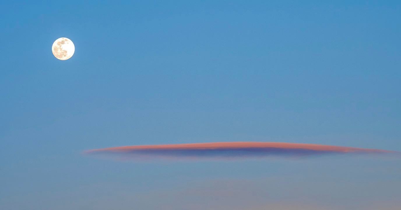 Moon and Lenticular Cloud composed in the sky above Teton Valley in Driggs, Idaho a few weeks ago. Simple shapes in the vast sky here provide endless exciting opportunities for making compositions that characterize this extraordinary high-altitude place! #driggsidaho #bestofthegemstate #tetonvalleyidaho #skyphotography #orcuttphotography.danstpeter.com #westernsky #celestialphotography