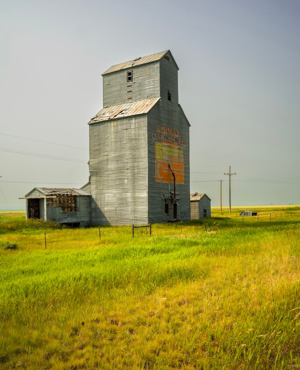 Grain elevator, Lewiston, Montana. In the grain-growing areas of the west and mid-west these historic grain elevators dominate the built environments of small rural towns, railroad crossings and farm collectives. Many of them are no longer active, having been replaced by pre-engineered metal buildings. Their long term fate is uncertain, but as cultural landmarks we would like to find a way for their preservation. #grainelevators #grainelevatorphotography #grainelevatorart #montanalandmarks #montanaphotography