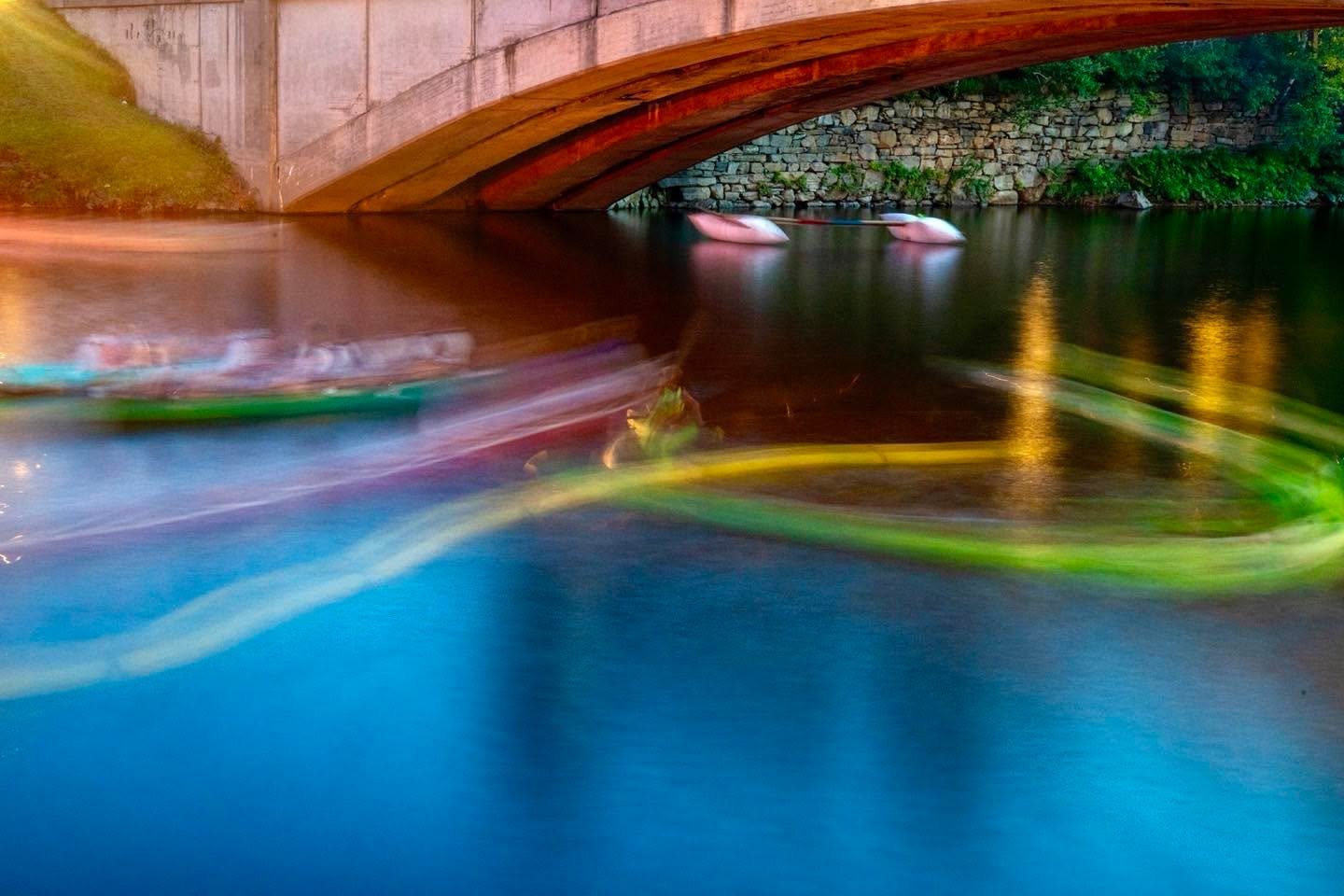 Boat swirls on the Mill Pond in Kingfield, Maine during the Fire on the Pond celebration this past weekend, a feature of Kingfield Days
